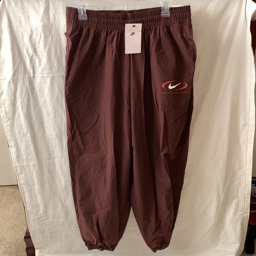 Nike Burgundy Track Pants with Small White & Orange Swoosh